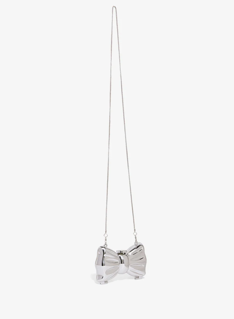 Ginger Bow Shaped Silver Metallic Statement Bag